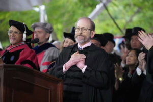 Harvard President Alan Garber acknowledges an extended round of applause during Harvard University’s commencement ceremonies May 29 in Cambridge, Mass. Harvard President Alan Garber acknowledges an extended round of applause during Harvard University’s commencement ceremonies, Thursday, May 29, 2025 in Cambridge, Mass. (AP Photo/Charles Krupa)